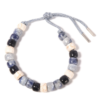 Il Sodalite Howlite ha bordato il braccialetto 13.5g con cavo d'argento intrecciato