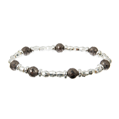 I braccialetti in rilievo dell'ematite 0.7mm mette l'oro in bianco e nero con argento