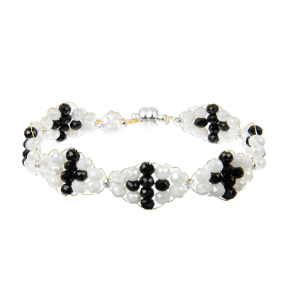 I braccialetti in rilievo dell'ematite 0.7mm mette l'oro in bianco e nero con argento