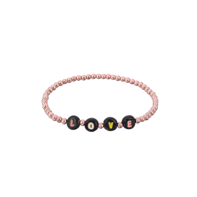 il braccialetto in rilievo della lettera di 3mm, nome ha bordato l'oro dei braccialetti in bianco e nero