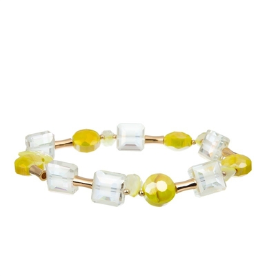 Pacchetto accatastabile elastico giallo del braccialetto tessuto Boho della nappa per gli anni dell'adolescenza
